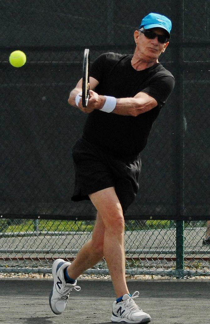 Neal Lebar playing tennis